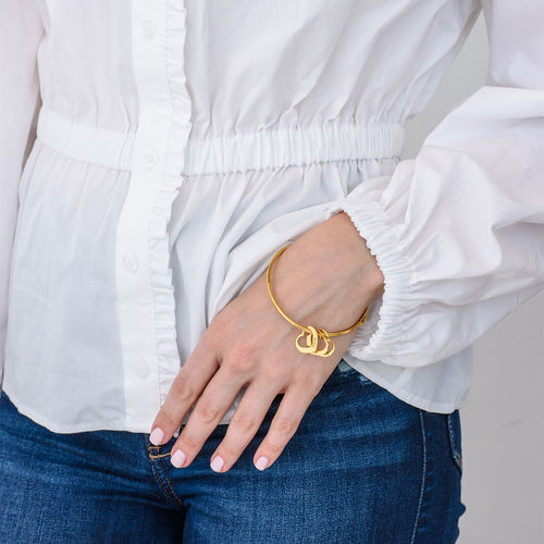 Bangle Bracelet with Heart Shape Pendants in Gold Plating