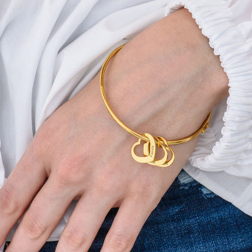 Bangle Bracelet with Heart Shape Pendants in Gold Plating