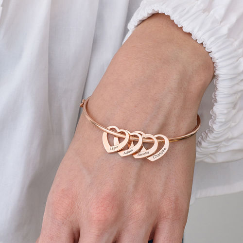 Bangle Bracelet with Heart Shape Pendants in Rose Gold Plating